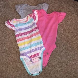 Trio of Lamaze brand newborn bodysuits, baby girl